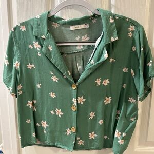 Crop button up top
